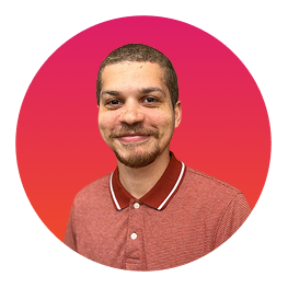 Man in collared shirt smiling