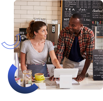 female cafe employee training male employee on POS