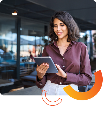 professional young woman smiling looking at tablet