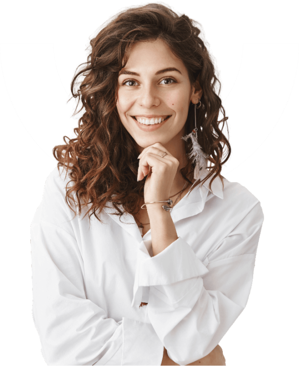 young woman smiling holding chin