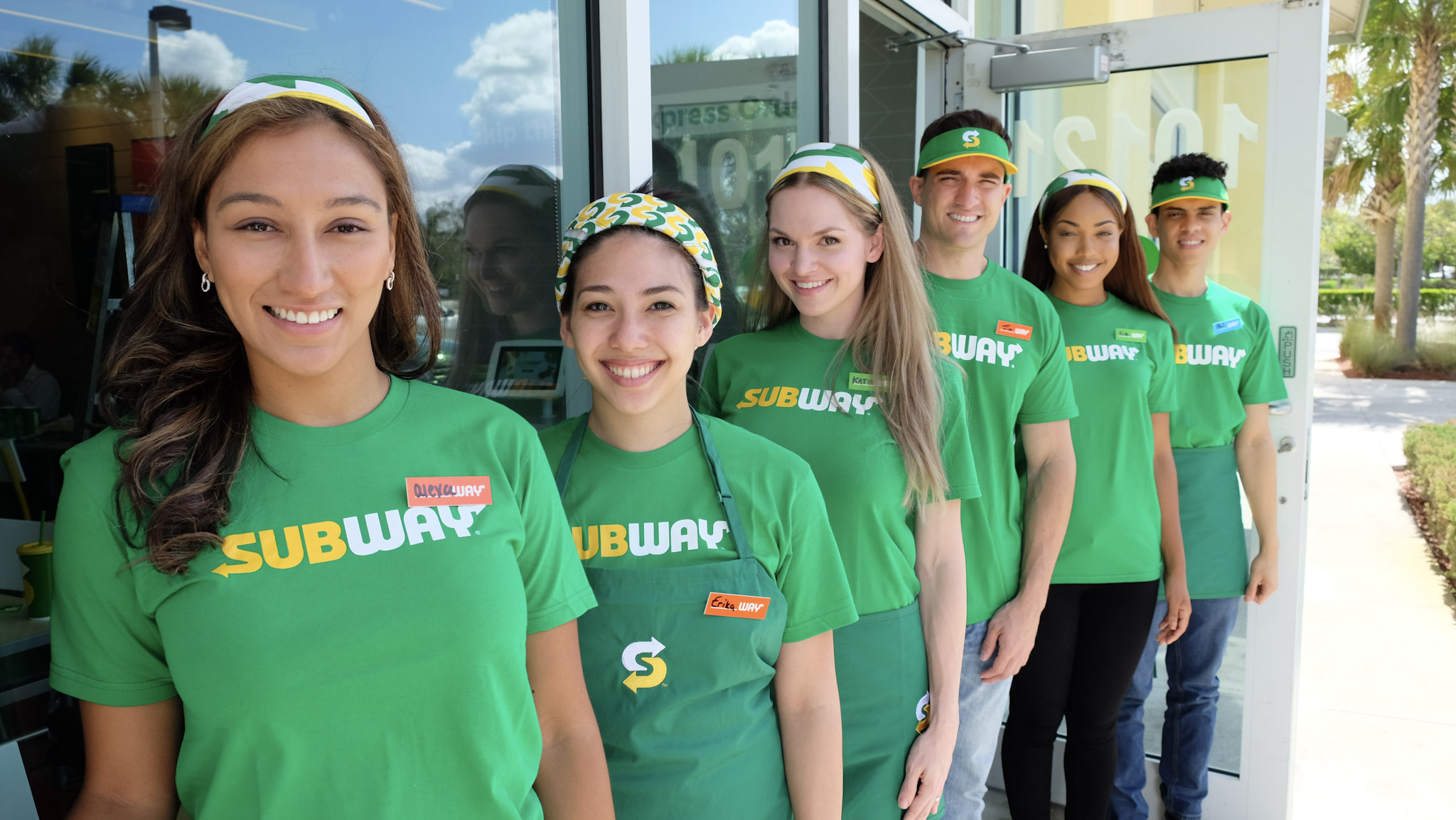 subway employees in front of store